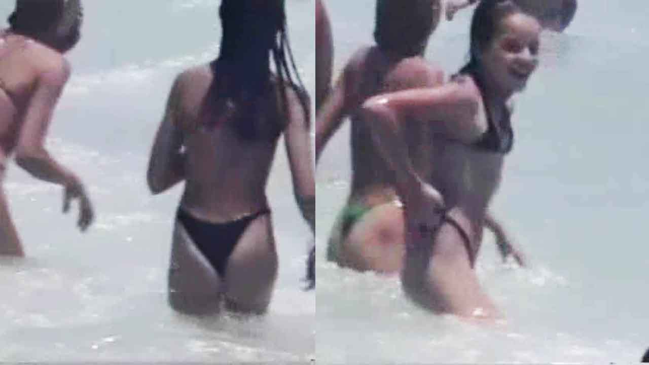 Real Voyeur - 2 sisters on the beach in tight bikinis