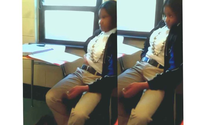 BLACK SCHOOLGIRL PUTS HER HAND IN HER PANTS AND RUBS HER PUSSY