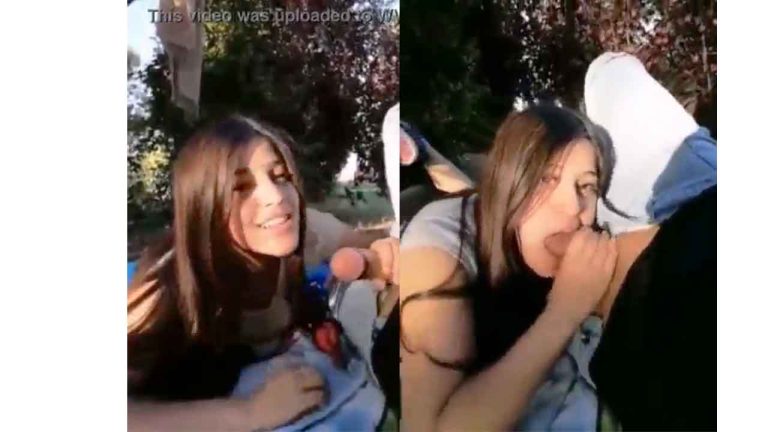Teen girl sucks her boyfriend's cock in a public park